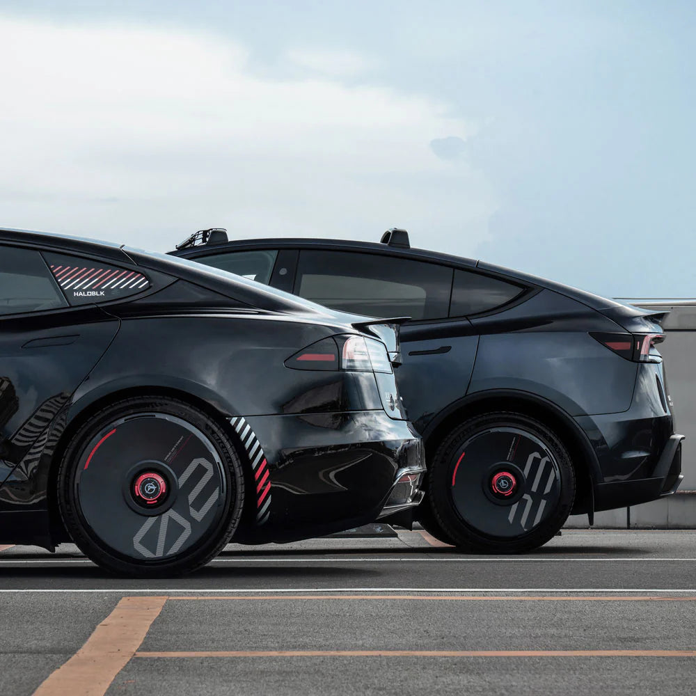 Two Tesla vehicles fitted with HALODISC 2 black wheel covers